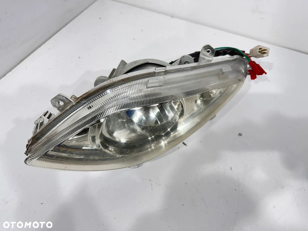 Lampa przód prawa Sym Joyride 125 - 1