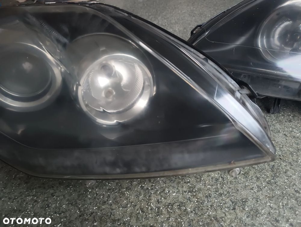 Renault Laguna III lampa przednia prawa lewa 260600074R 260100041R - 3