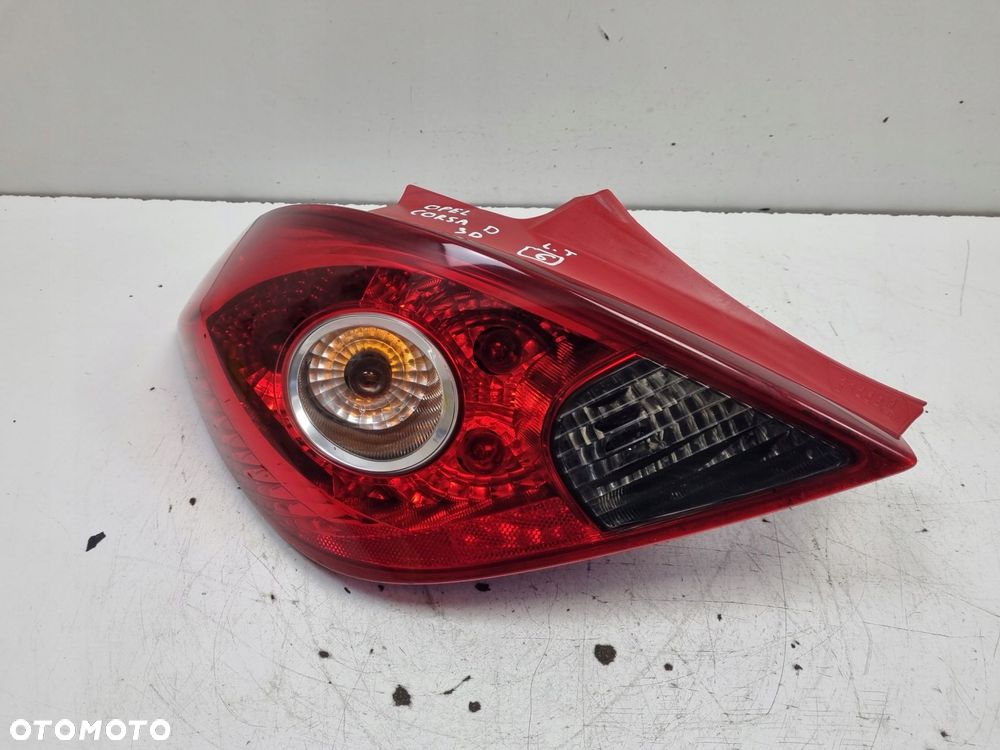 LAMPA TYLNIA LEWA Opel Corsa D 3D HTB 06-14r _ LEWY TYŁ 13211840 89038962 - 1