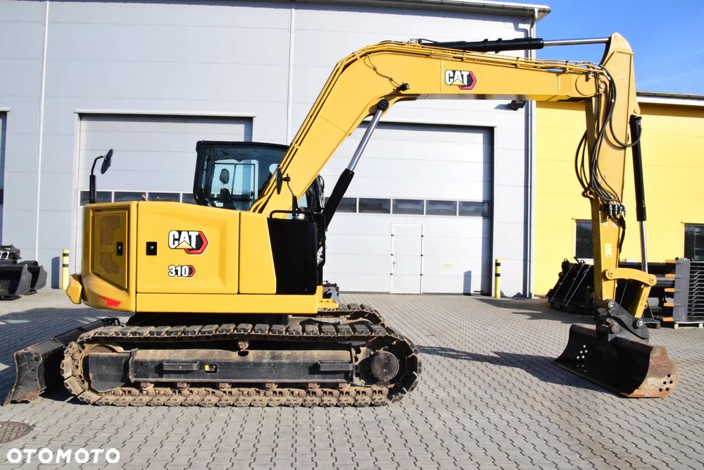Caterpillar 310 - 13