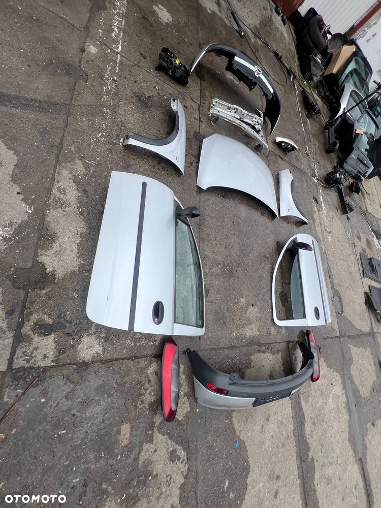 Zderzak przedni Corsa  drzwi prawe lewe przód tył lampy przednie tylne - 4