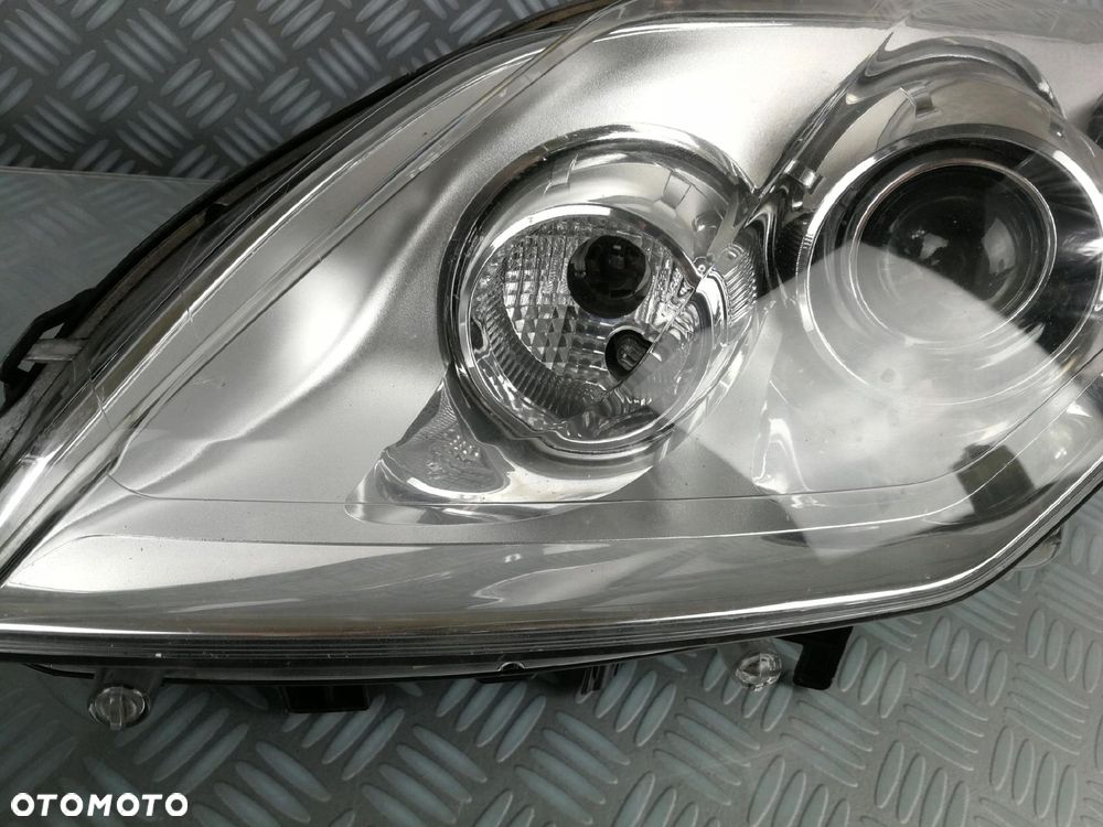 lampa reflektor prawy prawa lewy lewa przód przednia RENAULT LAGUNA III 3 - 5