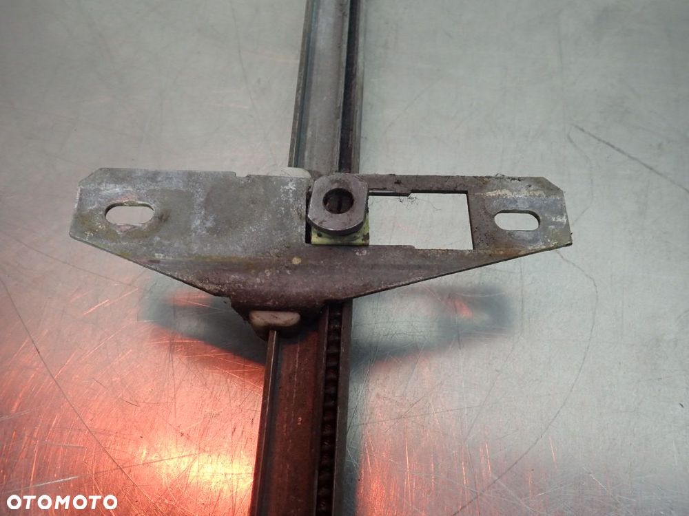 PODNOŚNIK SZYB LEWY PRZÓD VOLKSWAGEN T3 - 5