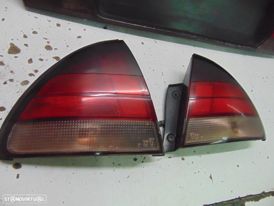 Toyota corolla xli farolins /Placa central - 8