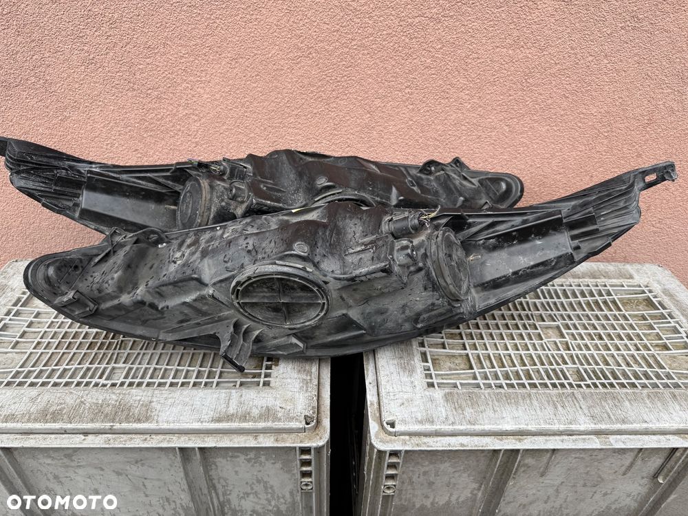 Lampa przednia FORD FIESTA MK7 SOCZEWKI KOMPLET EUROPA ORYGINALNE HELLA - 5