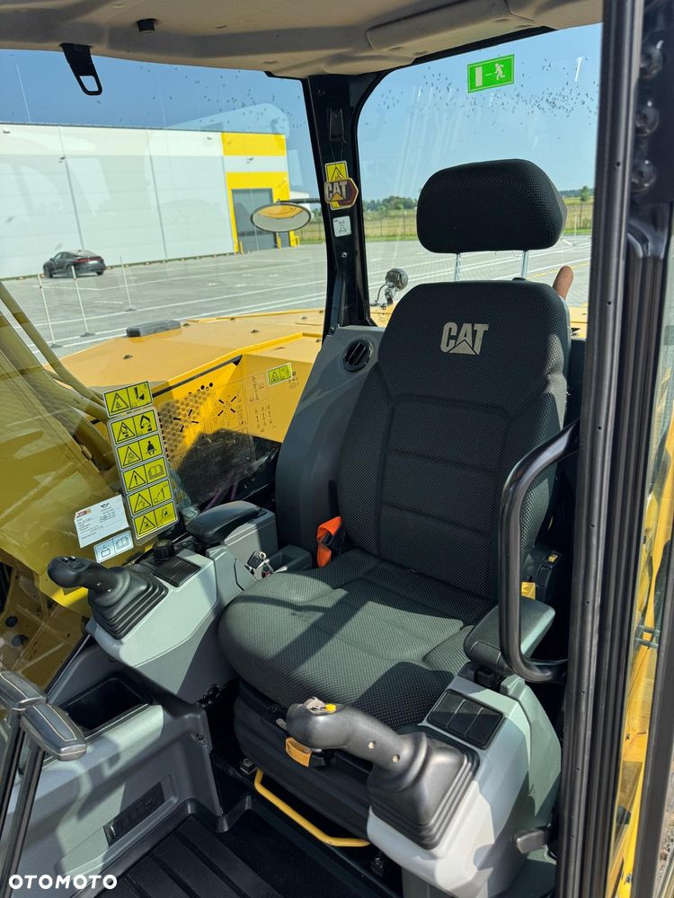 Caterpillar 310 - 26