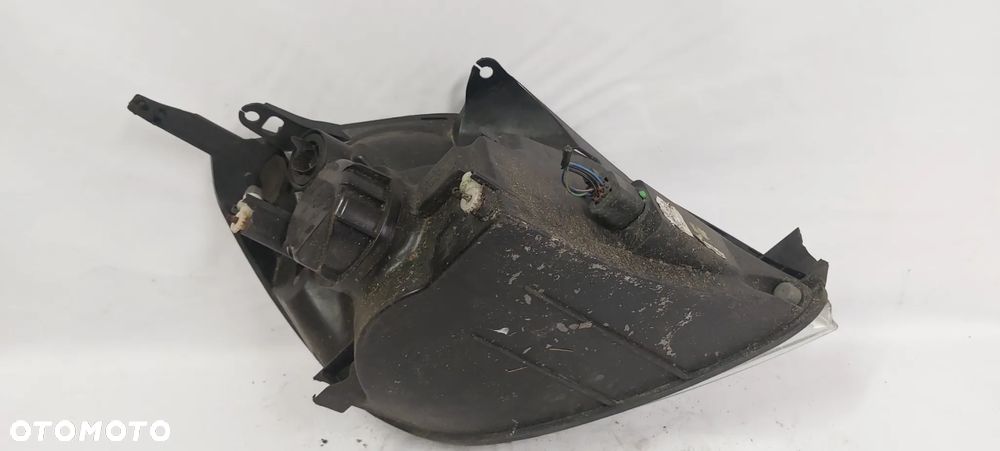 .  PRZOD PRZEDNIA LAMPA LEWA FORD FIESTA MK5 - 7