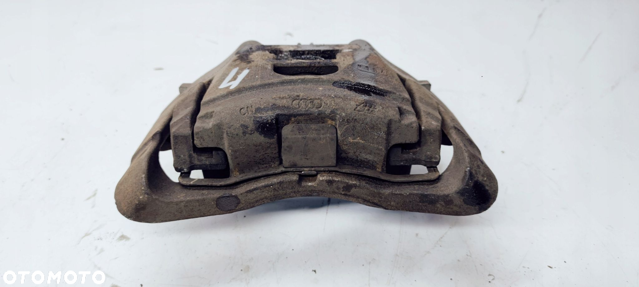 ZACISK HAMULCOWY JARZMO LEWY AUDI A6 C6 973 320MM - 2