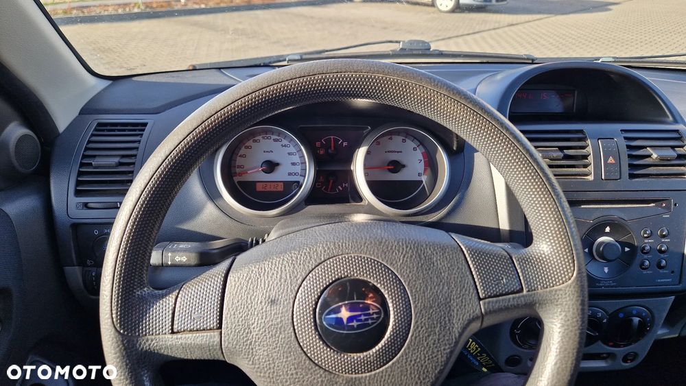 Subaru Justy 1.3 - 13