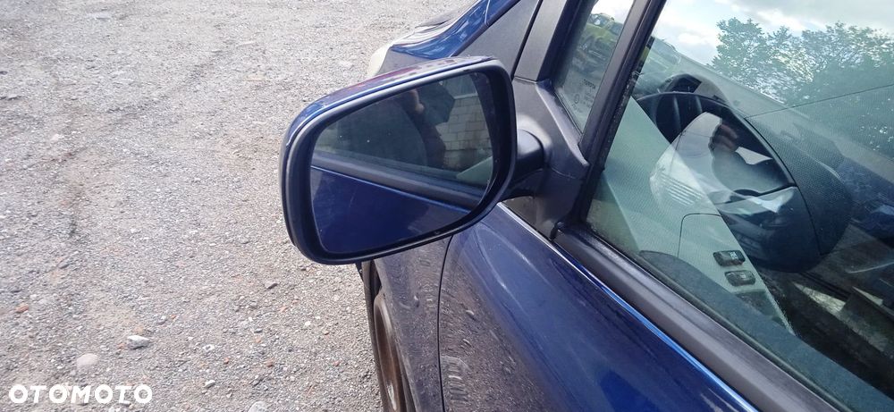Lusterko lewe prawe Toyota Yaris II 5D lak. 8P4 - 2