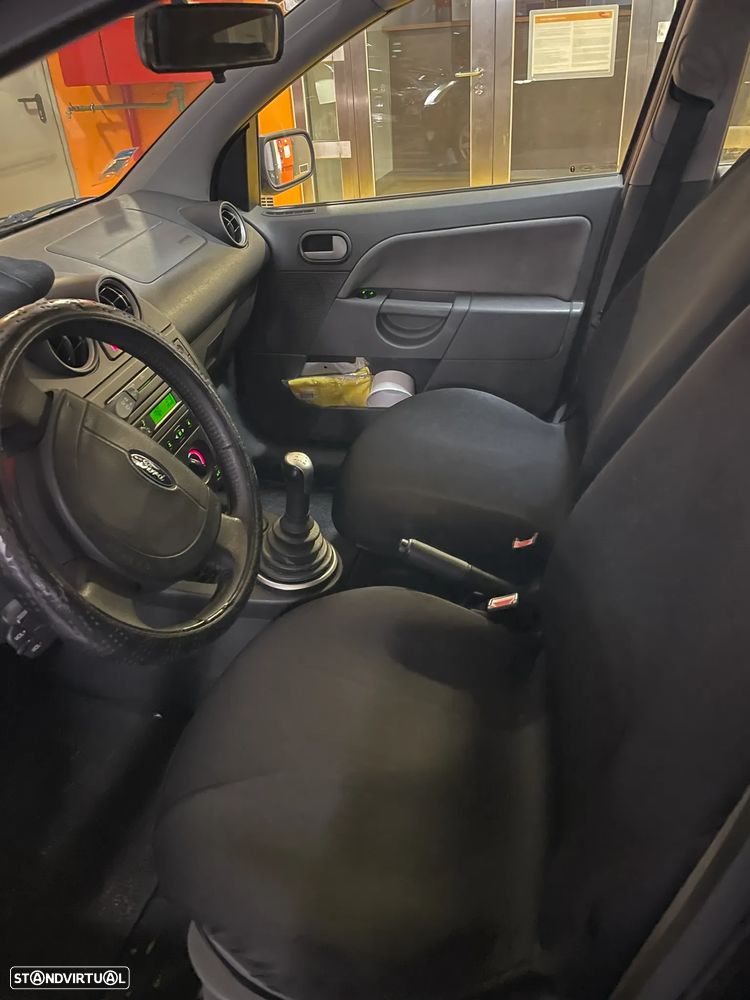 Ford Fiesta 1.25 Ghia - 10