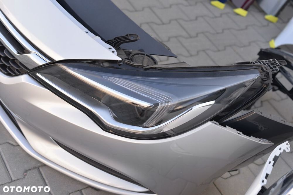 MASKA BŁOTNIK ZDERZAK LAMPA PAS OPEL ASTRA 5 K V - 15