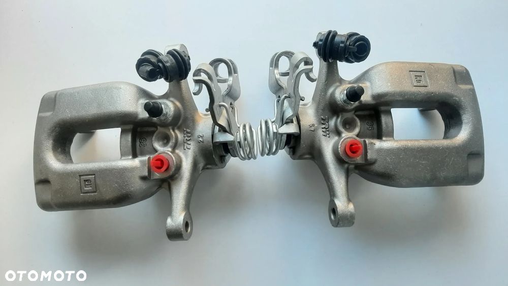 Zacisk tył Lewy Prawy Opel Astra K V - 1