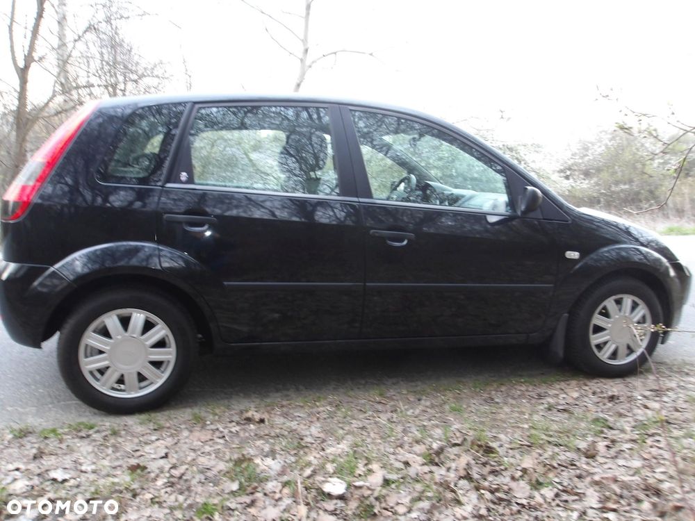 Ford Fiesta 1.4 Ghia - 6