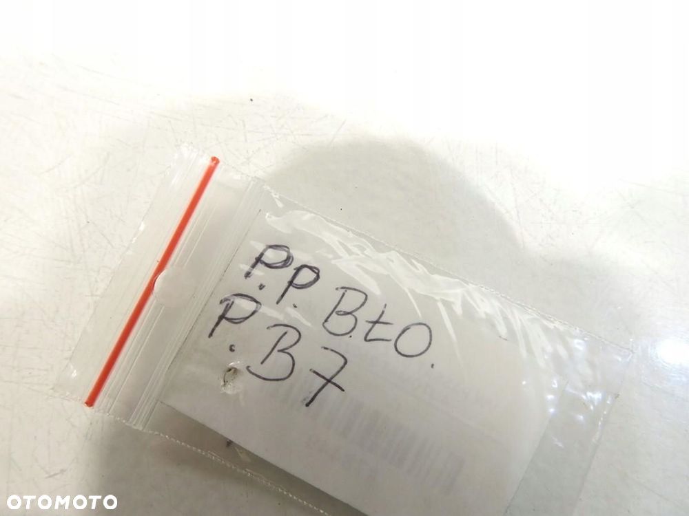 WYGŁUSZENIE BŁOTNIKA PRAWY PRZÓD VW PASSAT B7 3AA864236A - 2