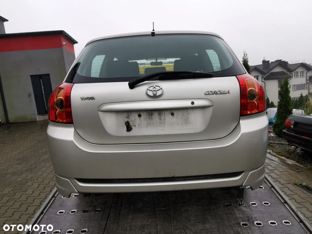 Klapa Toyota Corolla E12 2004r 5D - 1
