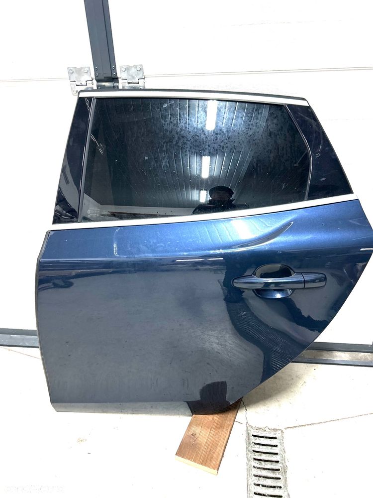 Volvo V-40 II drzwi lewy tył tylne lewe 2012-2016 kolor 498 Caspian blue