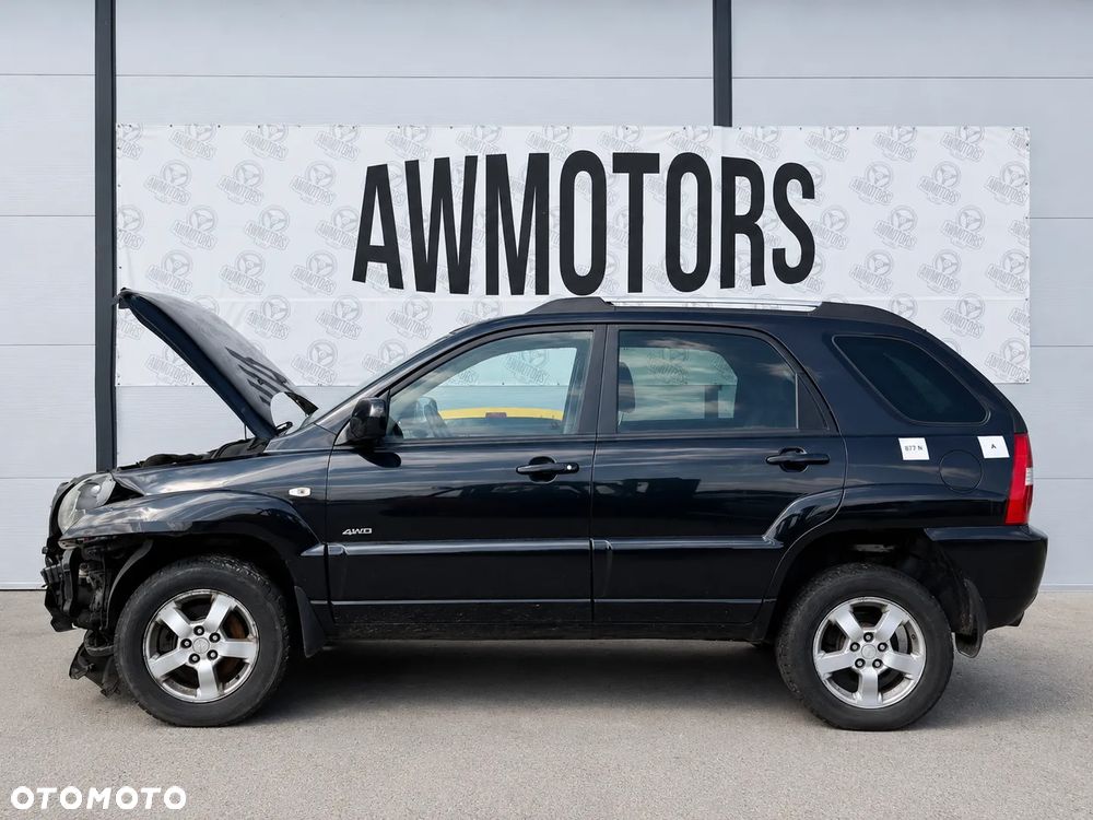 KIA SPORTAGE 2007 *SAMOCHÓD NA CZĘŚCI* 877 N BLACK PEARL MASKA, LAMPA, DRZWI, LUSTERKO, ZDERZAK, GRILL, BŁOTNIK, KLAPA, BELKA, DESKA, FOTELE, KANAPA, ĆWIARTKA KIEROWNICA, TARCZE, ZACISKI, ZAWIESZENIE, KOMPLETNY PRZÓD, KOMPLETNY TYŁ, LICZNIK, ZEGARY, PRAWE LEWE PRZÓD TYŁ - 3