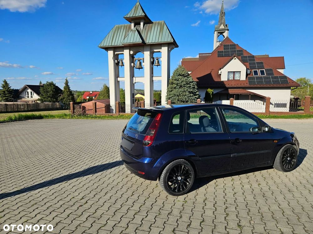 Ford Fiesta 1.4 Ghia - 13