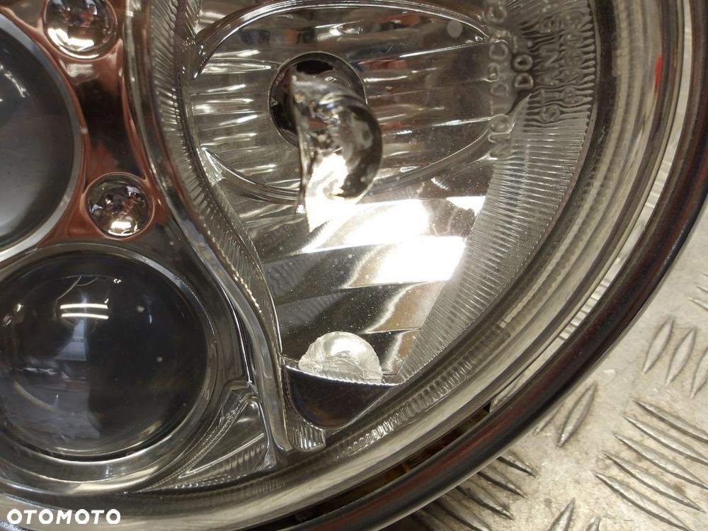 Lampa przód reflektor KAWASAKI VN 2000 VULCAN 04-09r   PN. 23007-0028 - 8