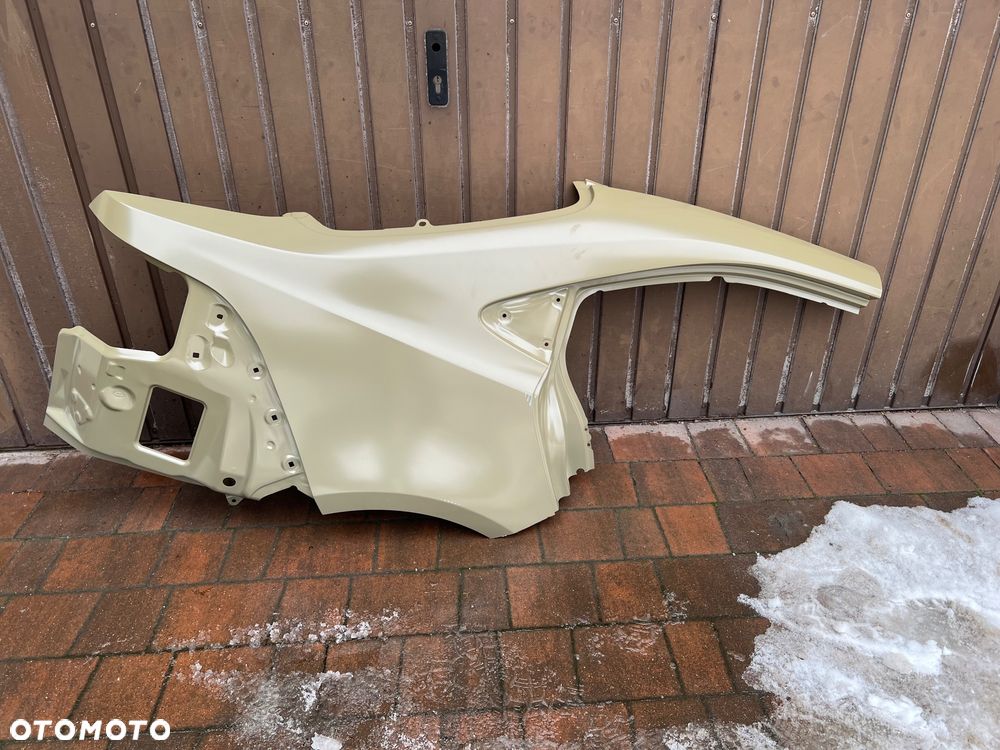 BŁOTNIK POSZYCIE PRAWY TYŁ TOYOTA COROLLA E21 SEDAN 18- NOWY ORYGINAŁ - 1