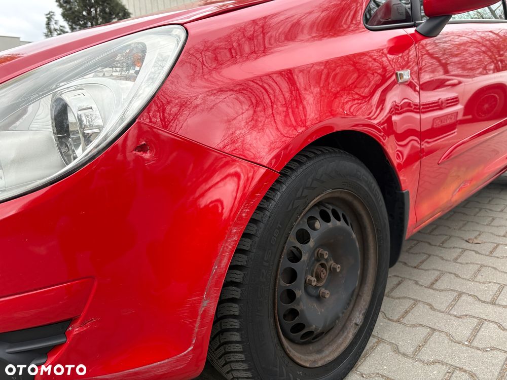 Opel Corsa 1.2 16V Enjoy - 11