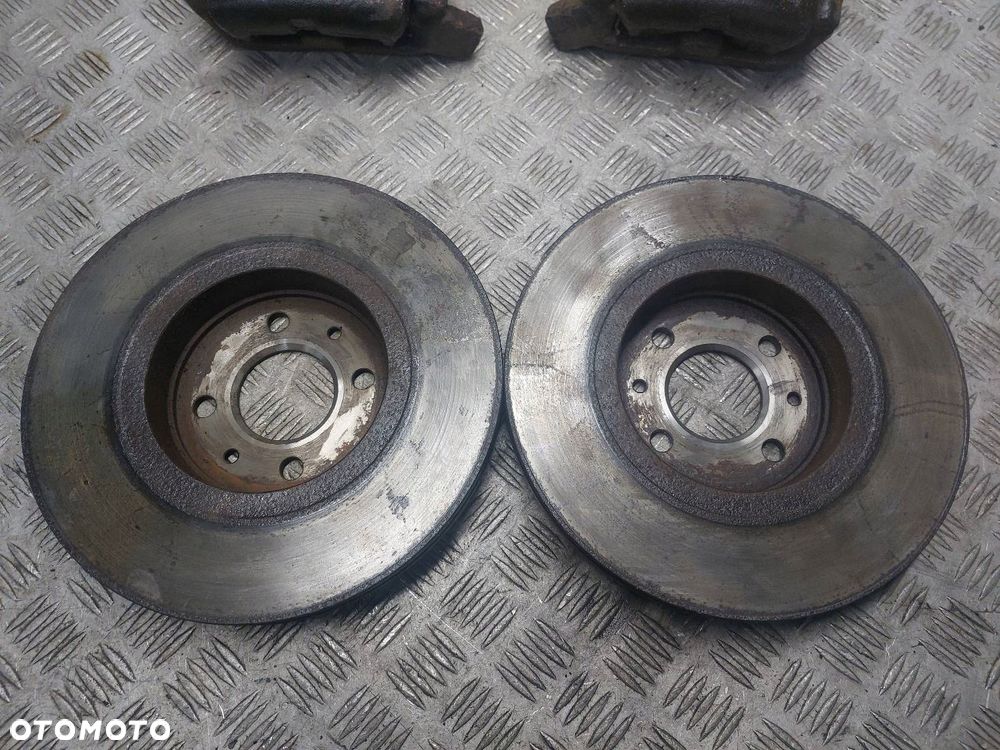 TARCZE HAMULCOWE PRZÓD + ZACISKI RENAULT MEGANE I LIFT 1.6 16V - 3