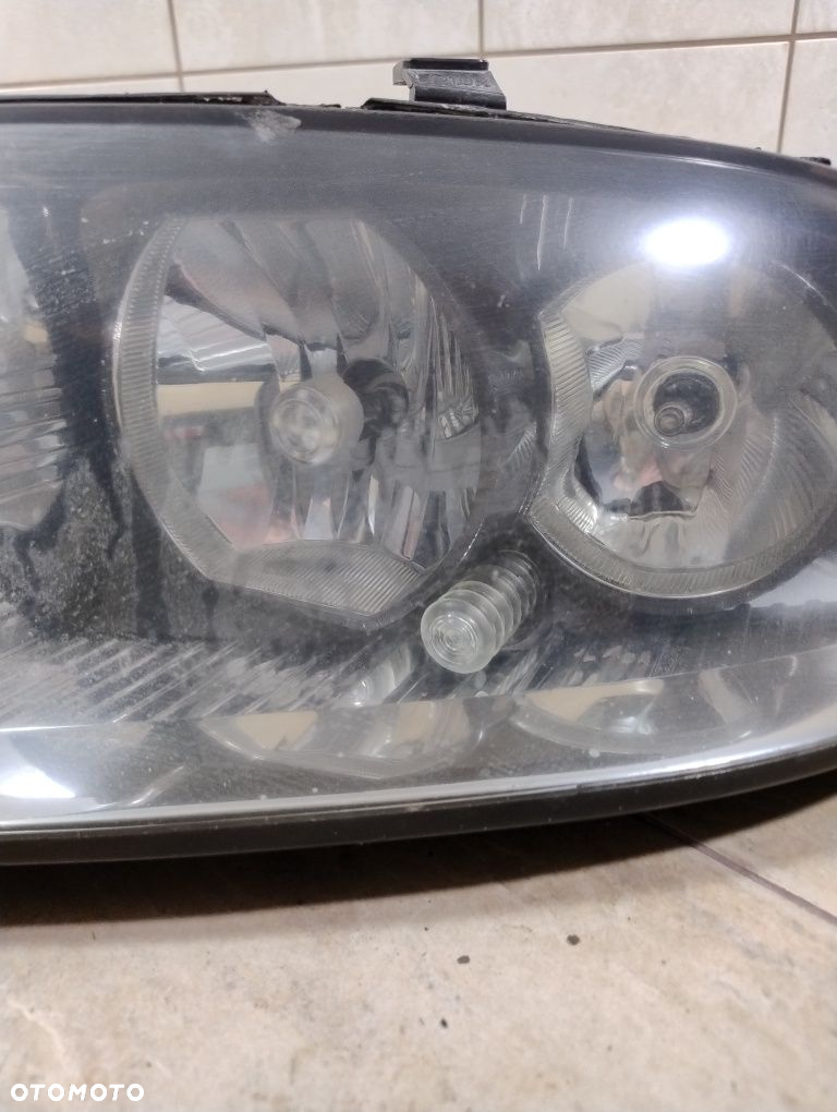 Audi a2 reflektor lampa lewa przód Europa oryginał wysyłka OLX - 3