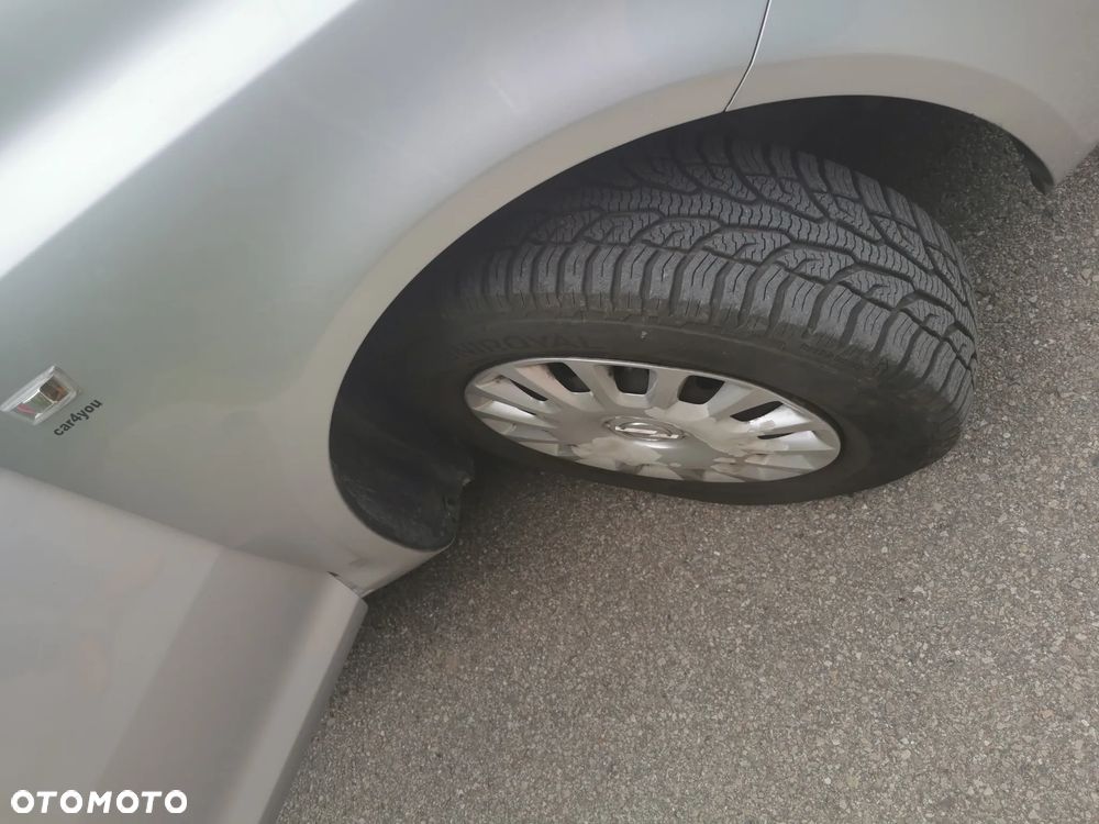 Opel Corsa 1.2 16V Enjoy - 12