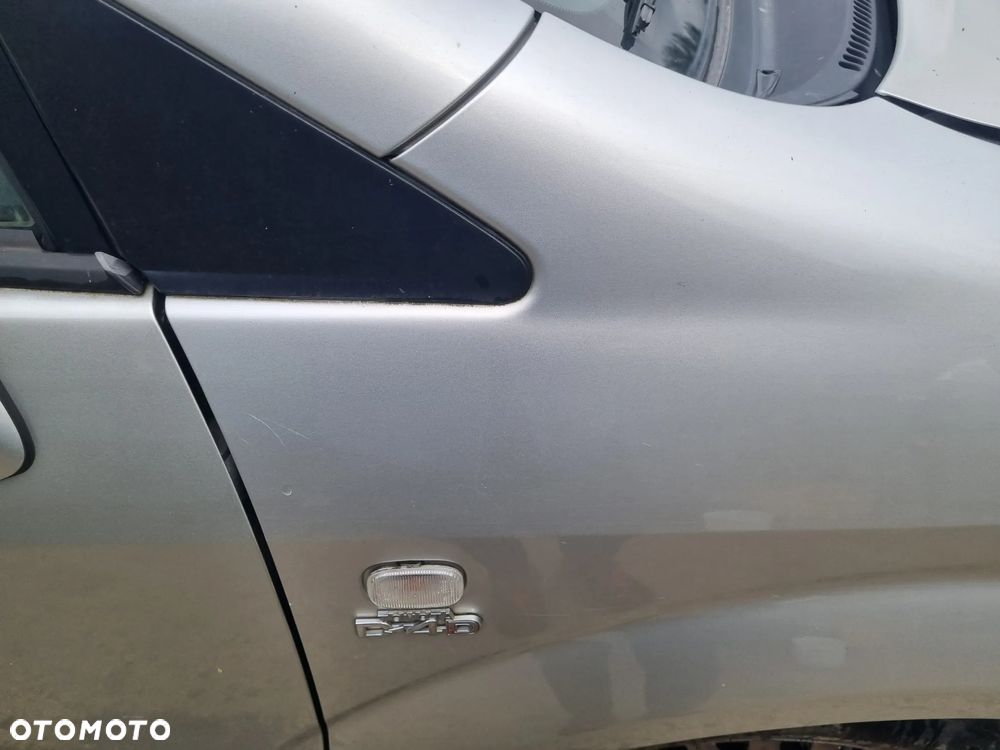 TOYOTA COROLLA VERSO II 04-07 2004 r. 1C0 błotnik prawy przód PP * - 6