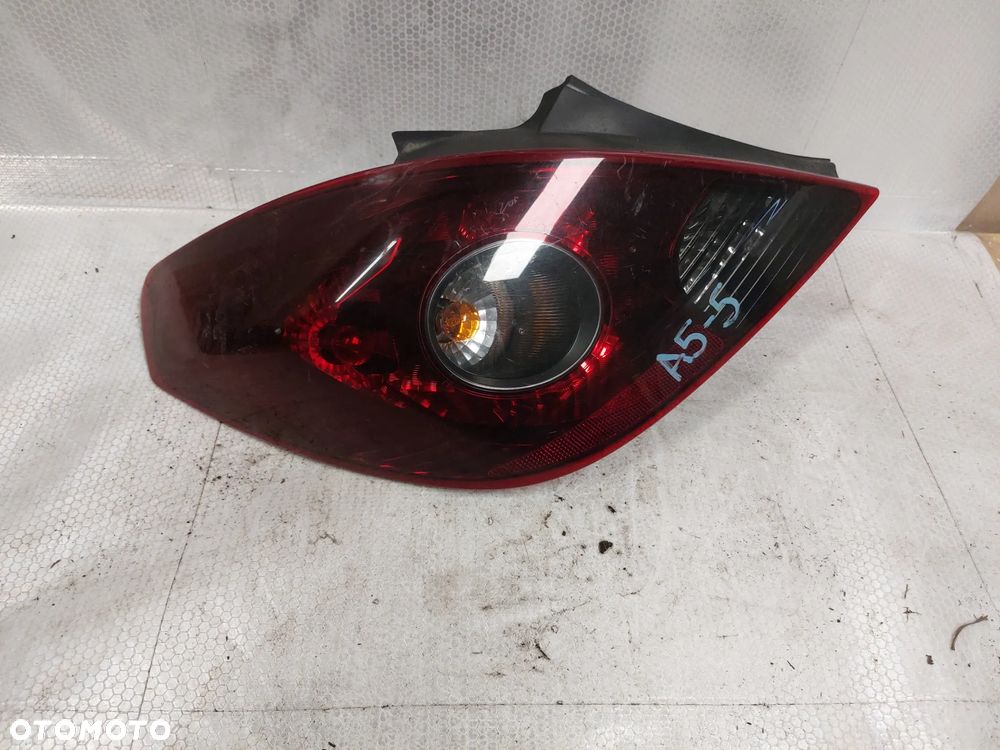 .  LAMPA TYL TYLNA LEWA OPEL CORSA D !3D ! ! CIEMNA ! - 2
