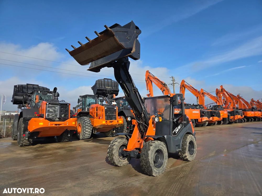 Hitachi ZW75, 2020, 1.915h, ridica 2,4t la 3,2m, CUPA 4x1 MULTIFUNTIONALA 1mc, cupa noua 1mc, furci, cupla rapida, aer conditiona, motor Deutz 75CP euro 6, Garda sol inalta 32cm, produs in Germania, STARE FOARTE BUNA, posibil leasing 4 ani-PROMOTIE 37.900eur - 35