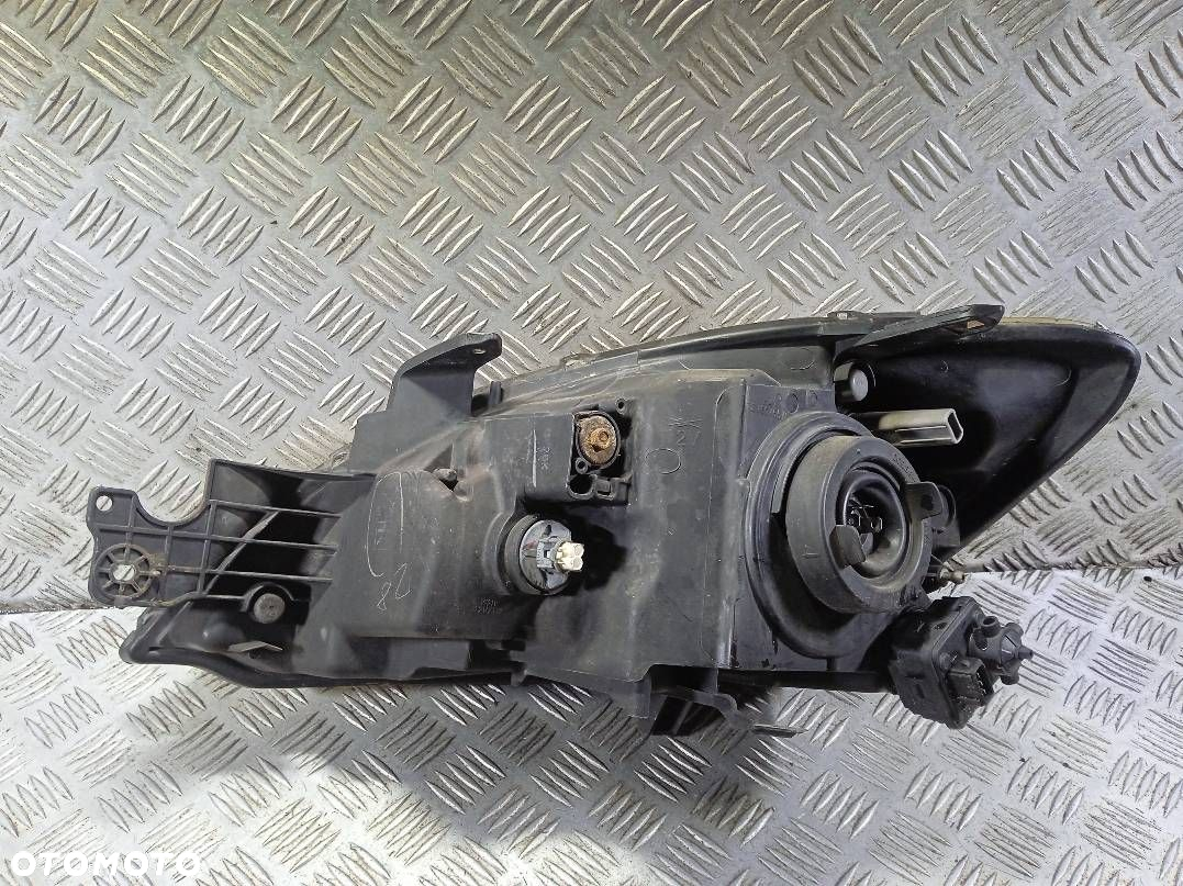 LAMPA PRAWA PRZEDNIA MITSUBISHI LANCER - 3