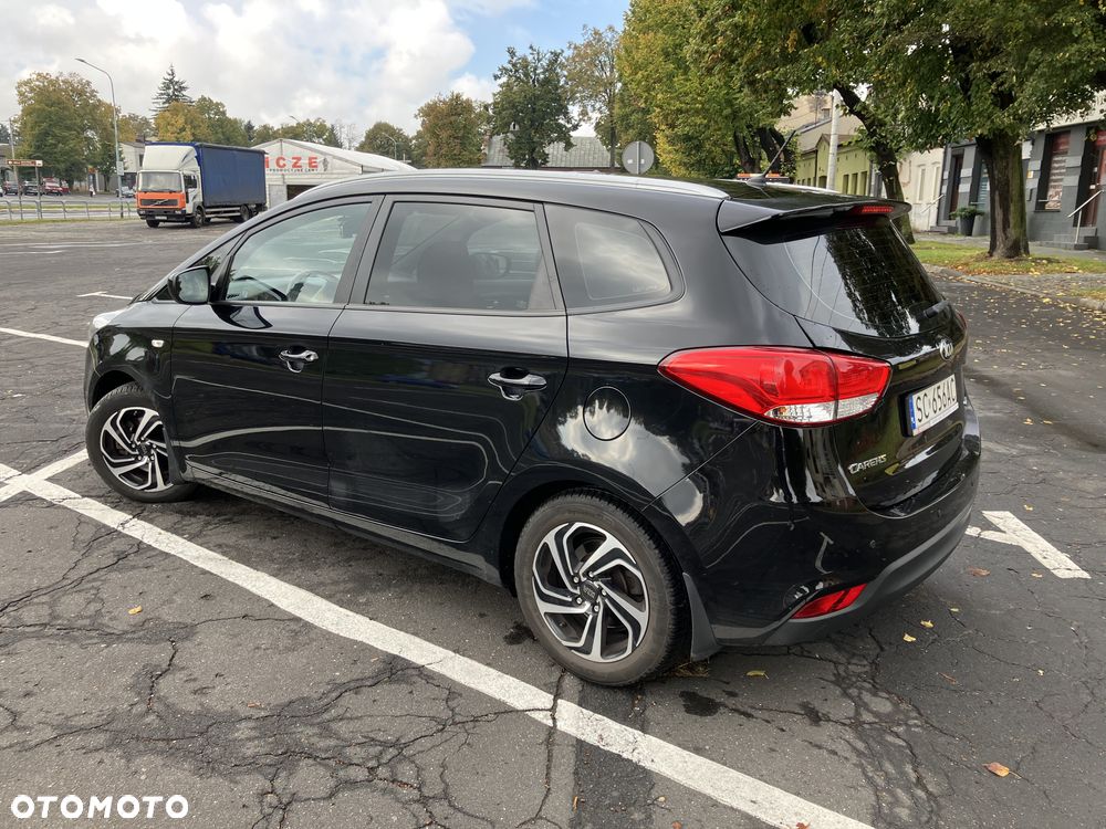 Kia Carens - 7