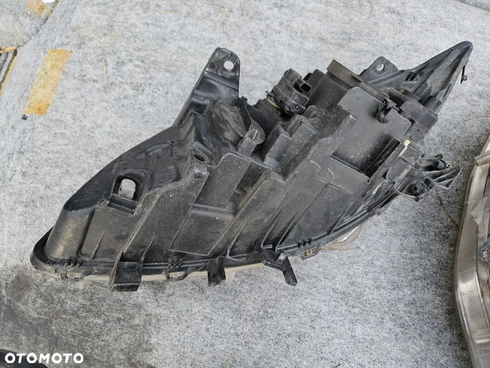 Lampa lewa prawa przednia Renault Laguna III 2009r soczewka Eu Europa - 8