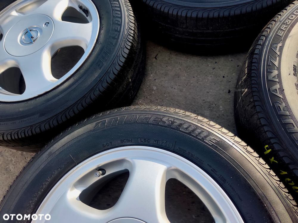 4x100 Felgi Aluminiowe Alufelgi Oryginalne 15 Koła Letnie Lato OPEL ASTRA G H CALIBRA COMBO C CORSA B C D VECTRA A B TIGRA KARL KADETT 4mm Legnica ALU-RAD 195/65 - 12
