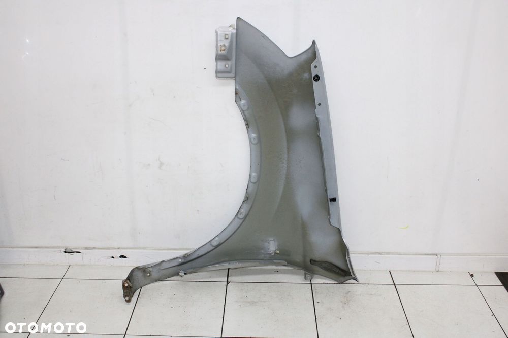 BŁOTNIK PRAWY PRZÓD PRZEDNI NISSAN QASHQAI I J10 2006R- K54 - KOD LAKIERU - 9