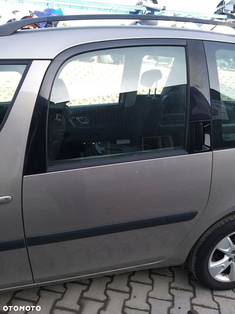 skoda roomster 06-15r drzwi lewe tył kompletne 9202 - 1