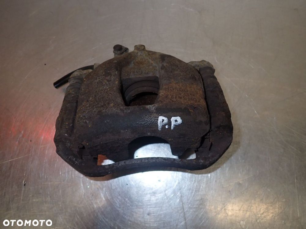 ZACISK HAMULCA PRAWY PRZÓD FIAT GRANDE PUNTO - 1