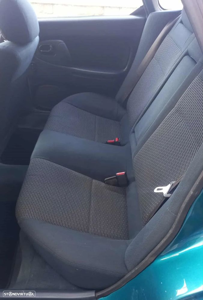 Mazda 323 F 1.5 - 11