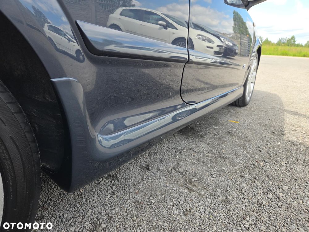 Opel Astra 1.8 Sport - 24
