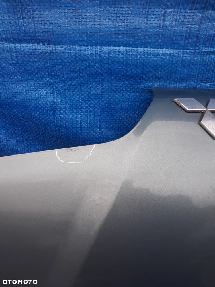 MASKA MITSUBISHI CARISMA  KOLOR: G64  2002r - 4