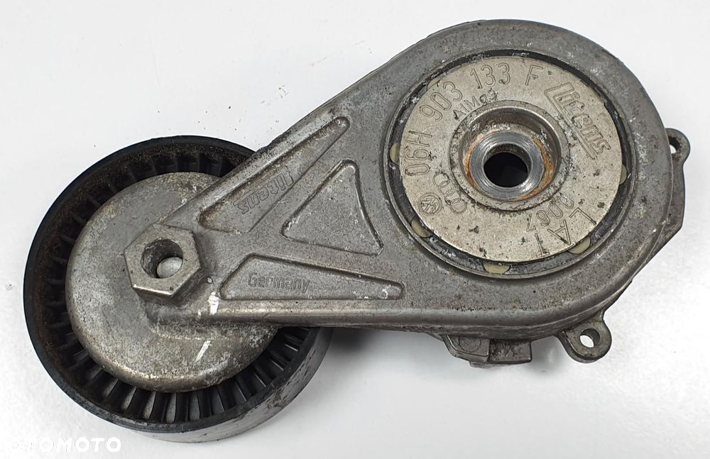 NAPINACZ PASKA KLINOWEGO AUDI A4 B8 2.0 TFSI 06H903133F - 2