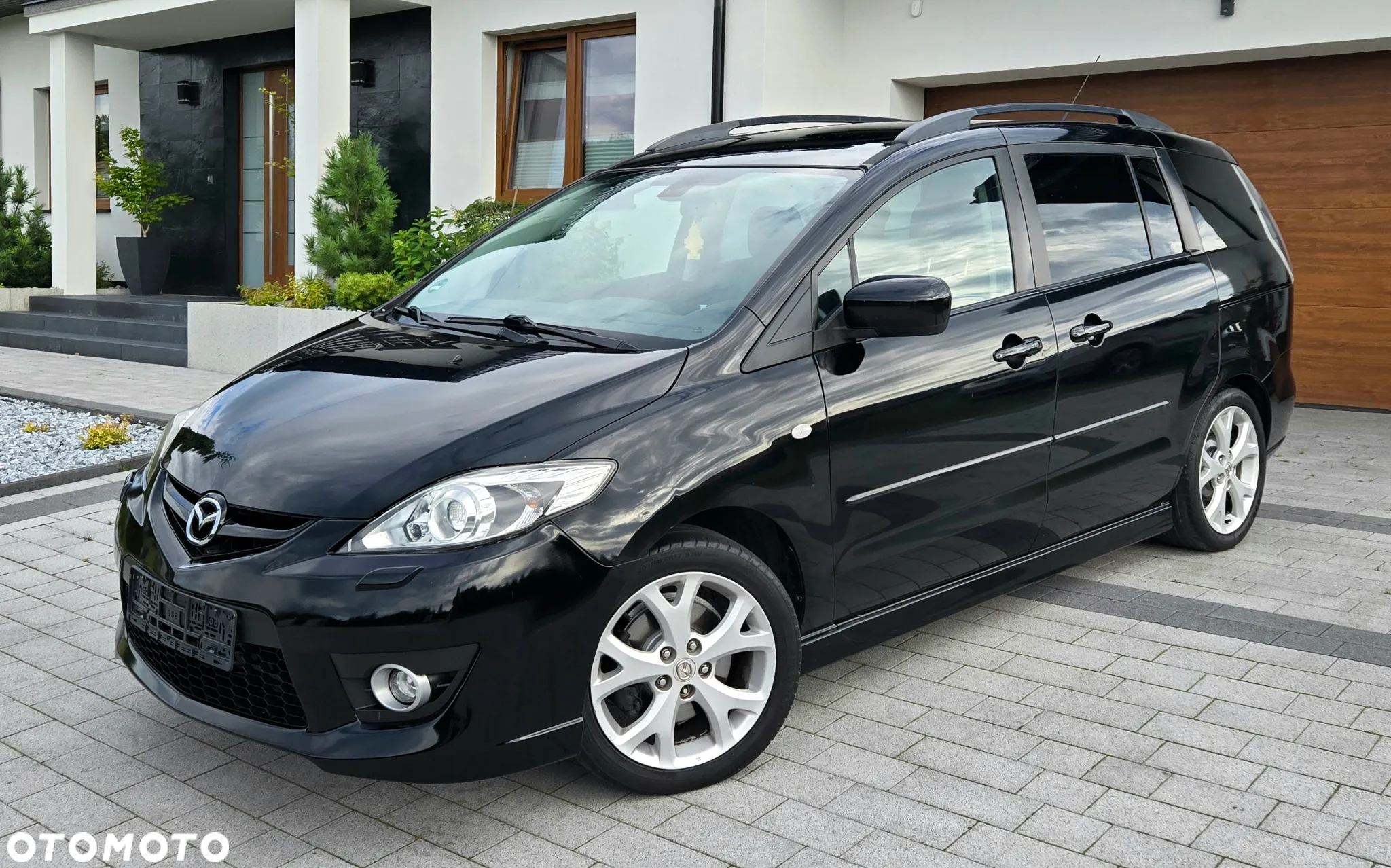 Mazda 5 2.0 Exclusive + - 9