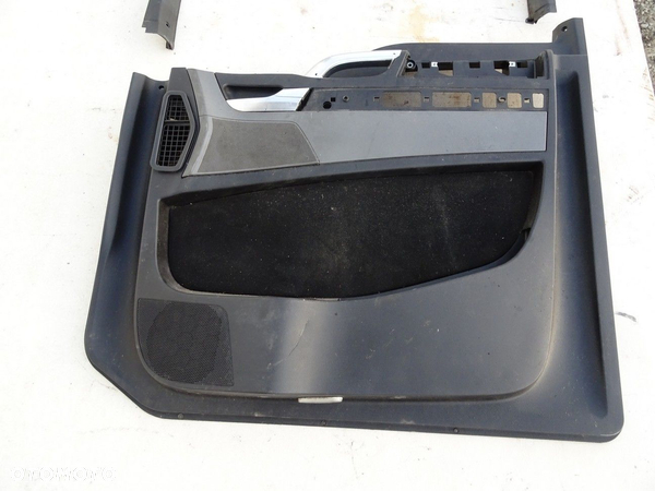 BOCZEK DRZWI PRAWY TAPICERKA - 135.60 PLN - MAN TGX I 2006 - 2022 18.480 81.6230