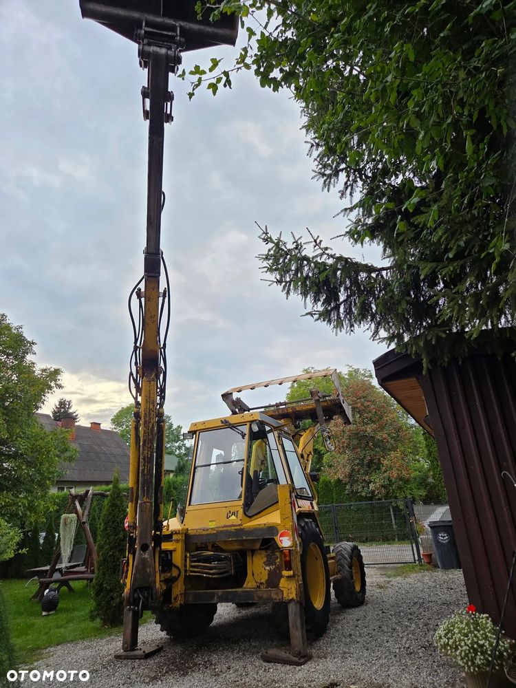 Caterpillar CAT 428B - 15