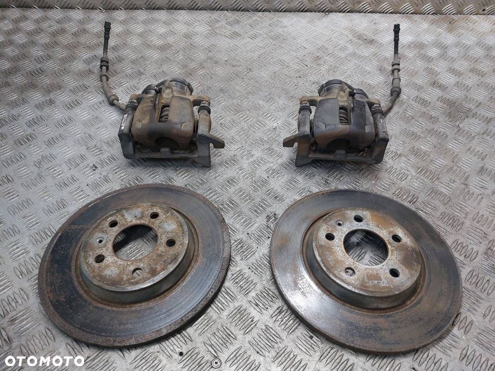 TARCZE HAMULCOWE TYŁ + KLOCKI + ZACISKI AUDI Q5 8R 8K0615601B 32335478 - 1
