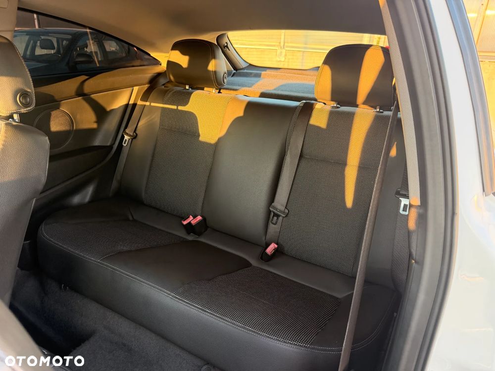 Opel Astra 1.8 Sport - 12