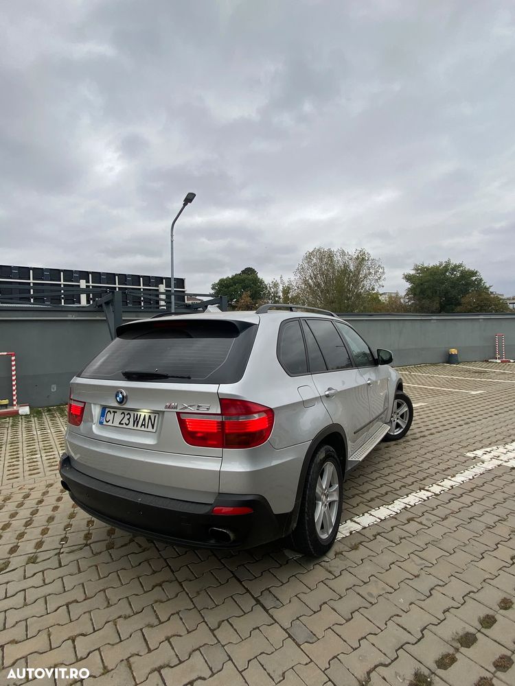BMW X5 2009 — imagine 13