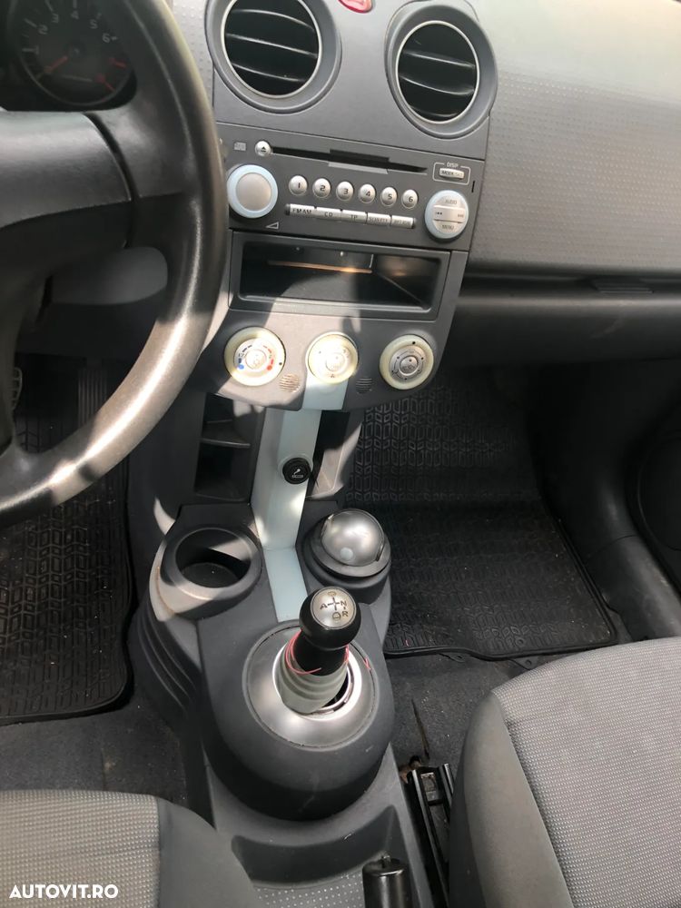 Dezmembrez Mitsubishi Colt 4 usi gri argintiu benzina cutie automata 2006 - 4